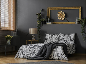Dark grey, gold & natural wood bedroom